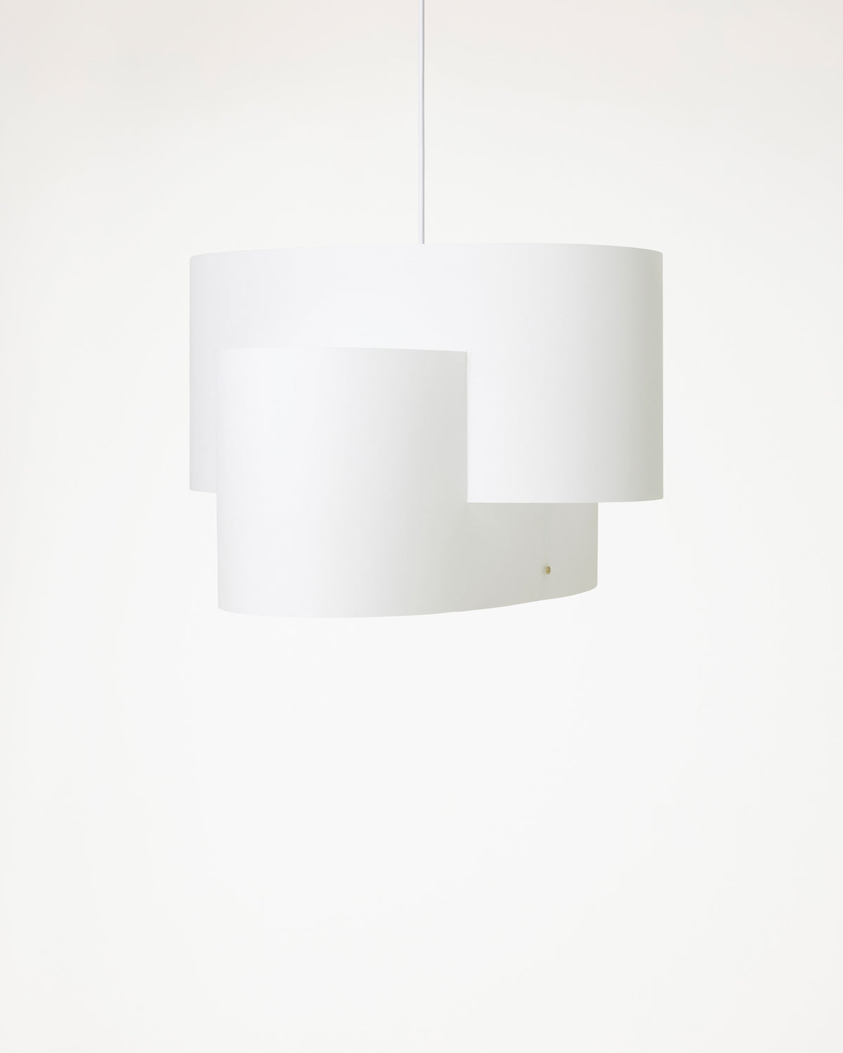 A multilayered white lamp giving soft light