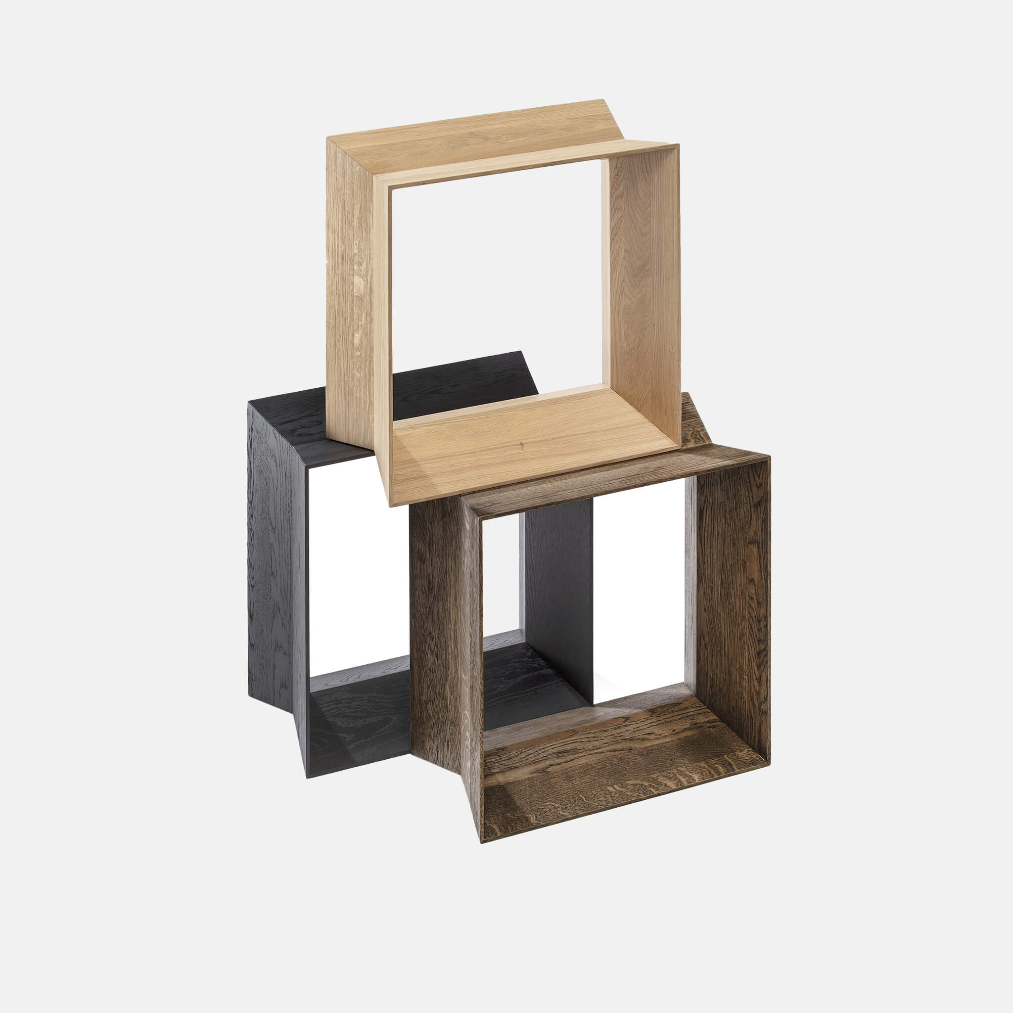 Set of three oak stools stacked together
