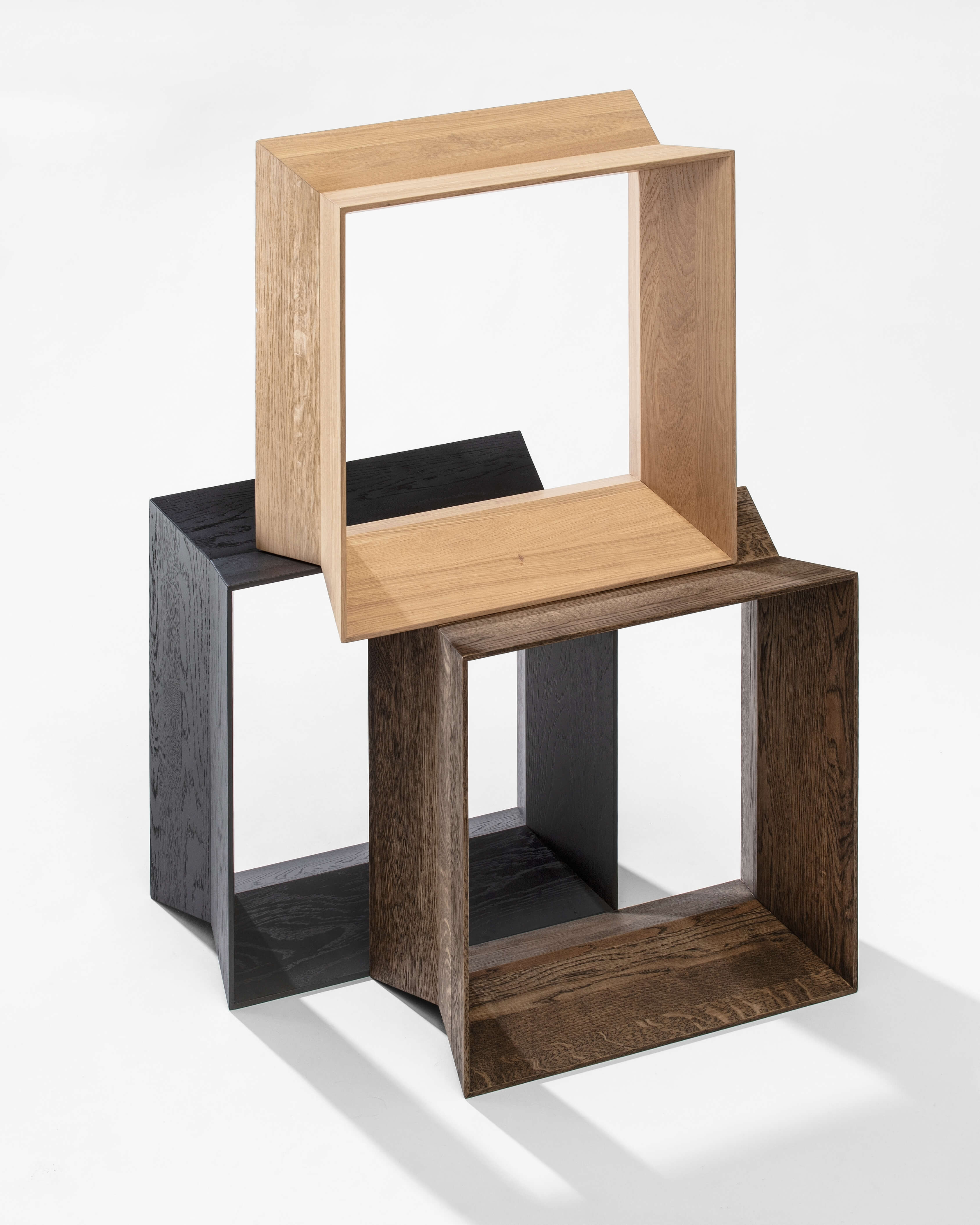 Reflex stools in natural, smoked and black solid oak, full silhouette on white background by Motarasu