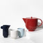 Close up of porcelain tea set, side view
