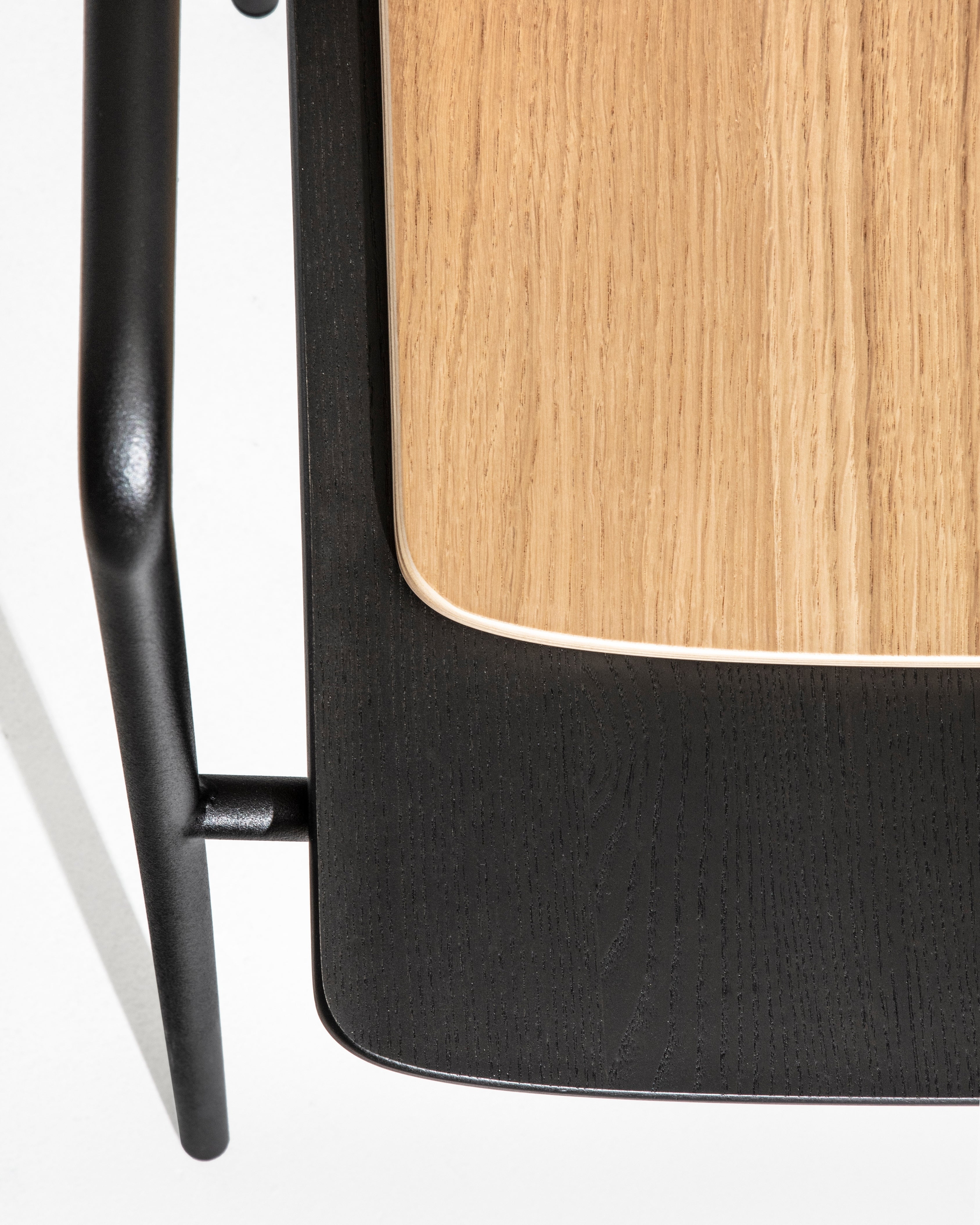 Float chair in natural oak and black ash veneer, both finishes side by side on white background by Motarasu