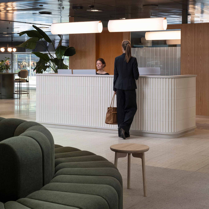 Enso 120 pendant in oak and coated washi paper above the reception desk, Jyske Bank headquarters, Glaskuben, Copenhagen
