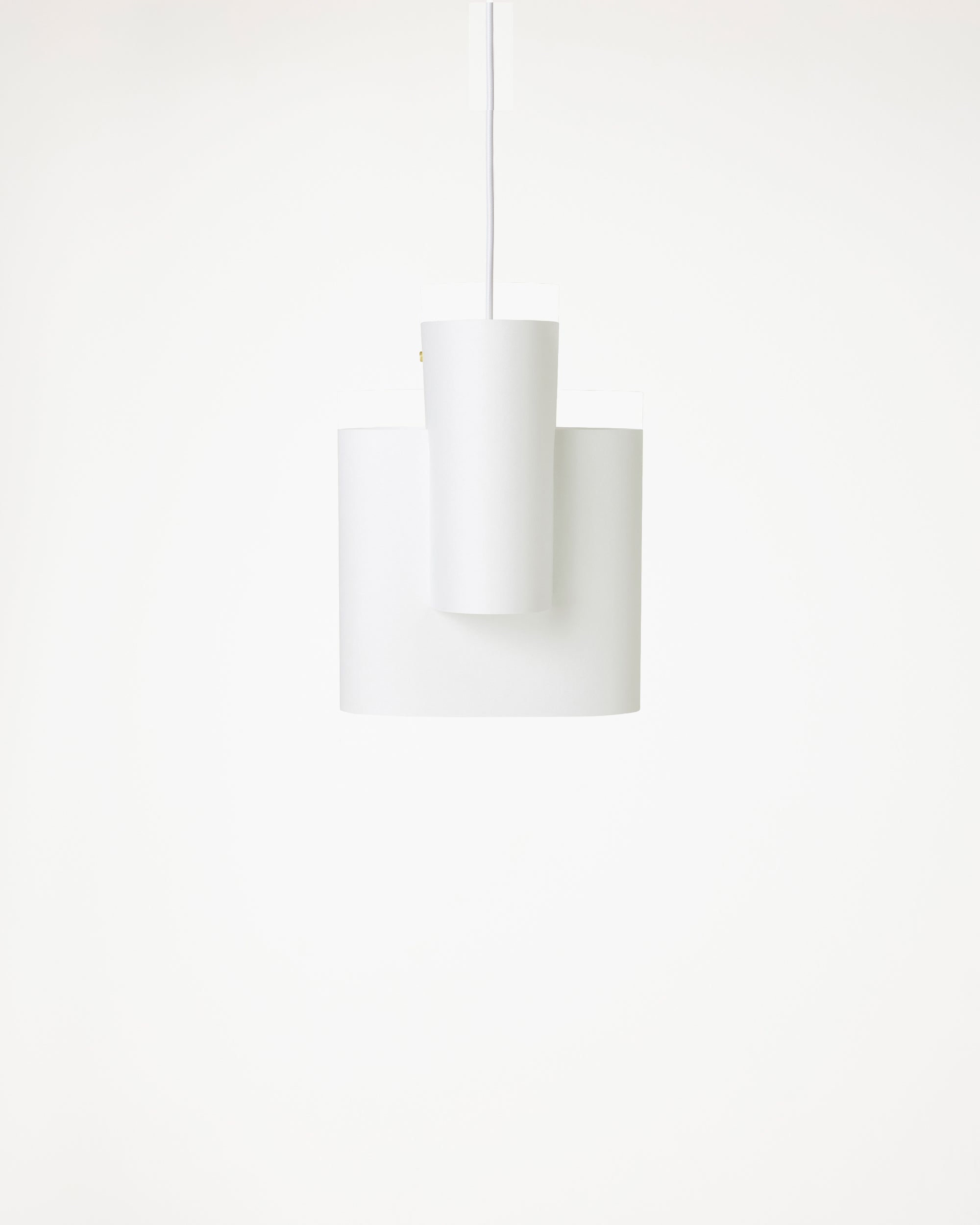 Sekiun 23 pendant in layered white washi paper, hanging against white background showing asymmetric form by Motarasu