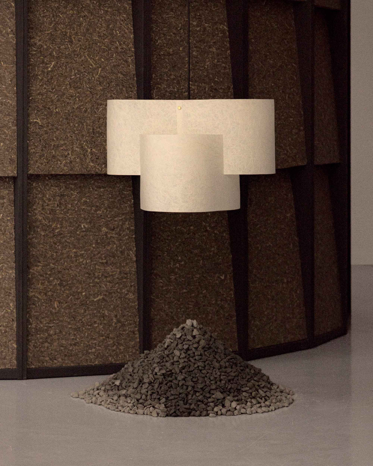 Sekiun 50 Raw pendant, mulberry fibres visible through the lit washi surface
