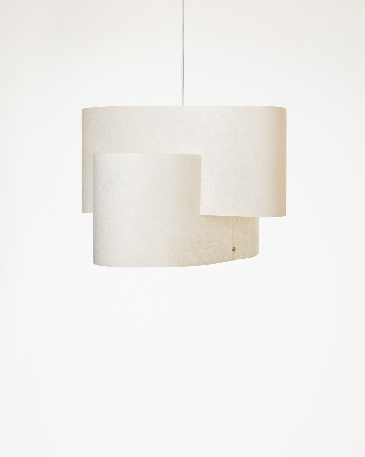 Overlayering pendant with warm paper shade
