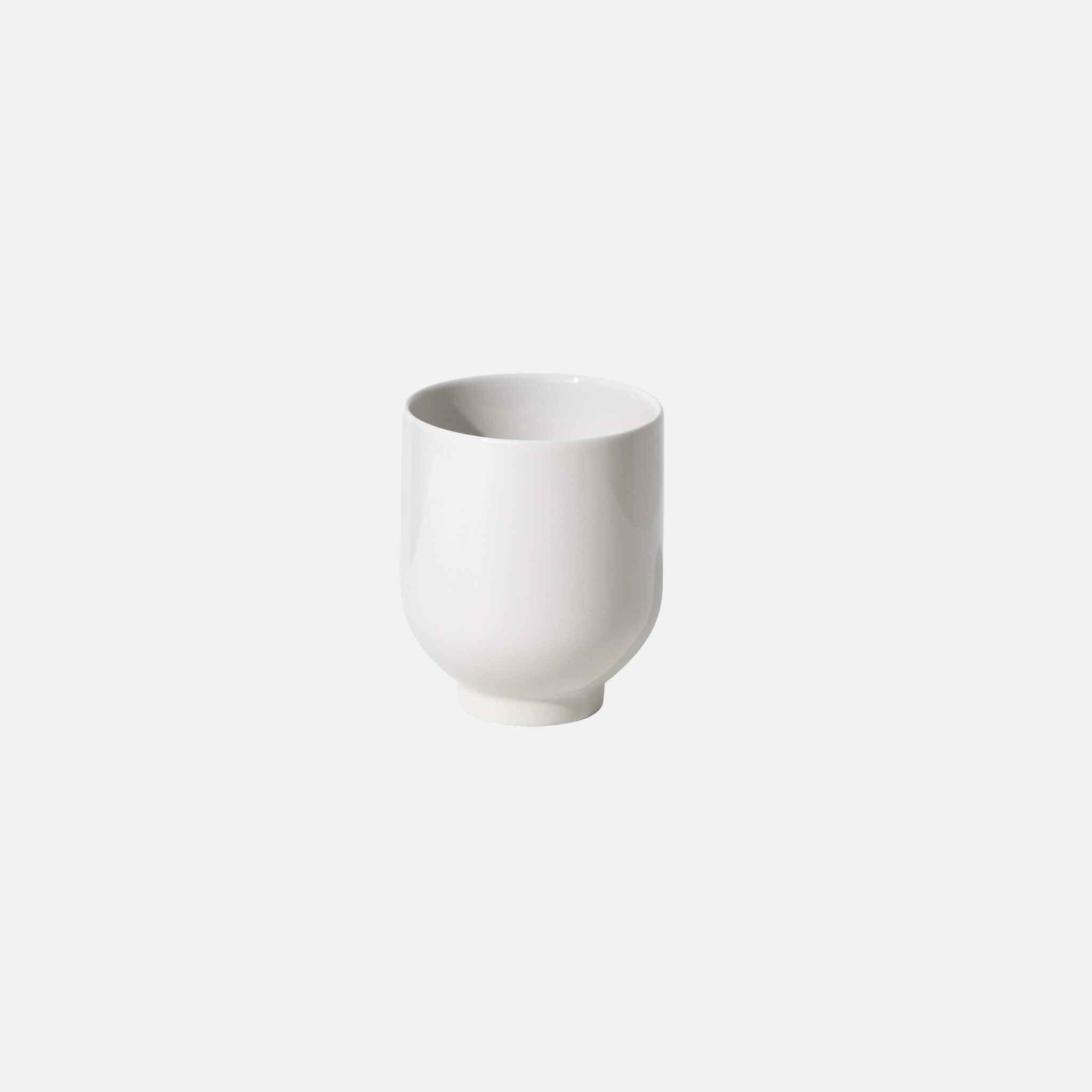 White cylindrical tea mug, front view