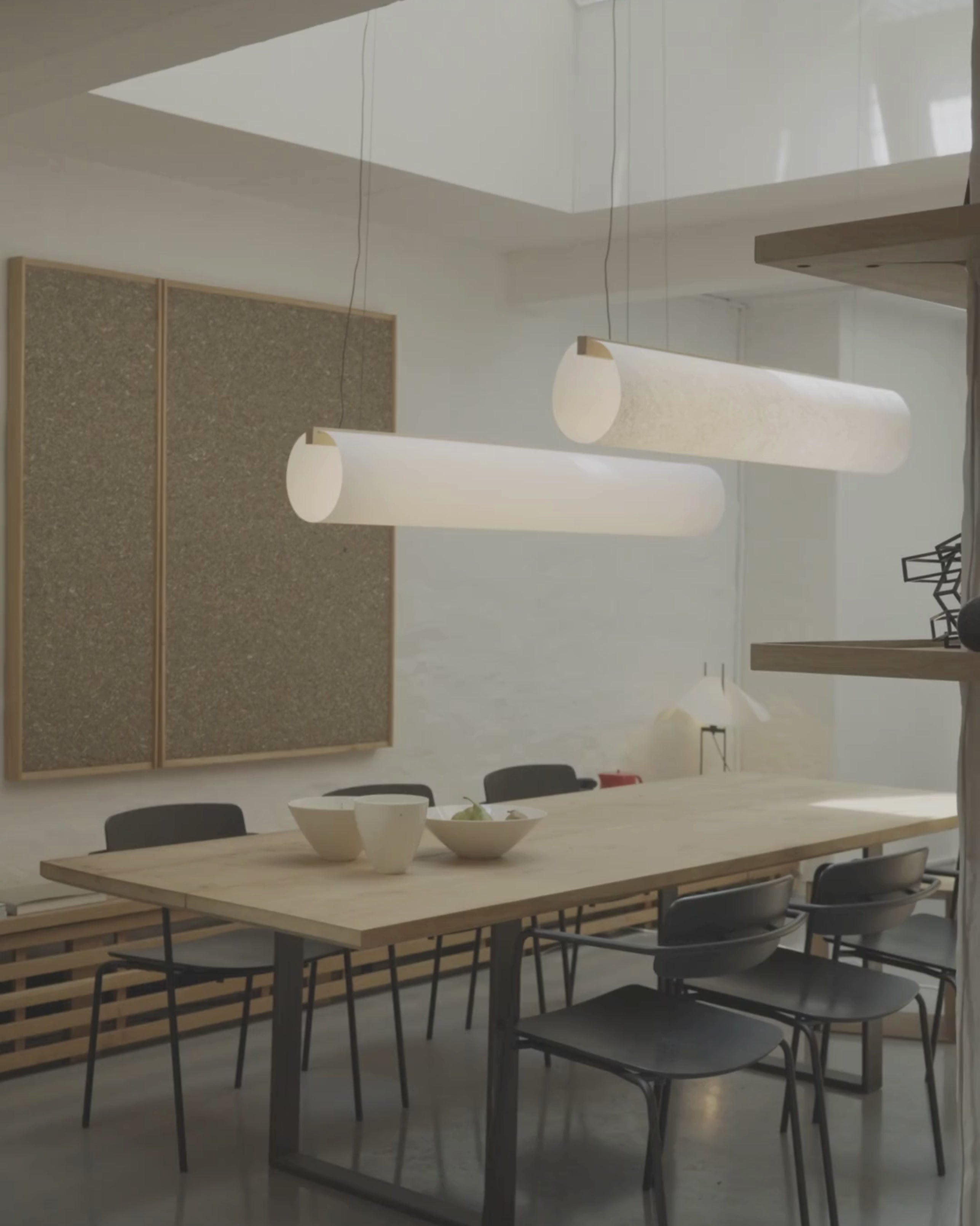 Enso Pendants in washi paper and oak, styled above a dining table in calm interior by Motarasu